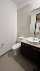 Modern kitchen with stainless appliances, granite counters, dark cabinets PH Mosaic