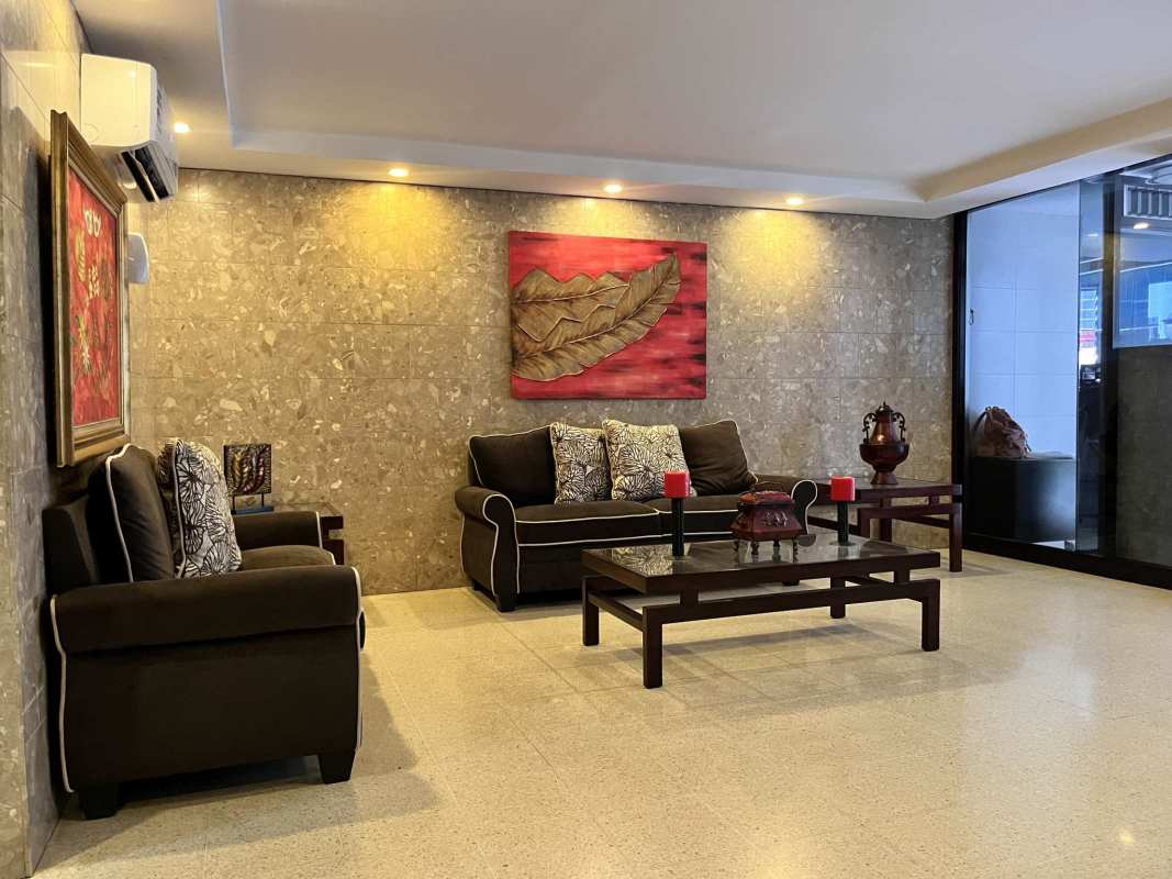 Large living and dining room with natural light, beige floors in PH Bahía Marbella Panama City