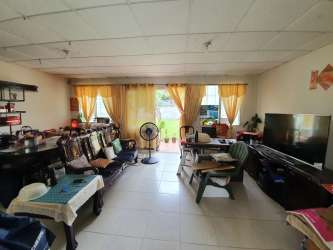 Kitchen with dual windows and cabinet space in Villa Las Palmeras Panama