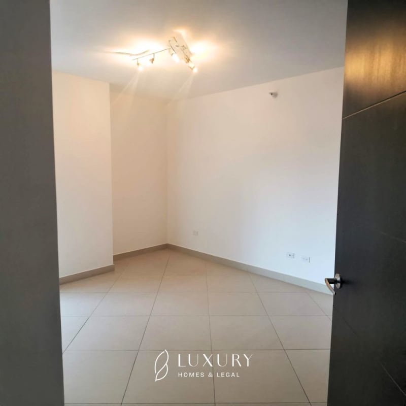 Spacious master bedroom with ocean views and walk-in closet at PH Country Club Panama