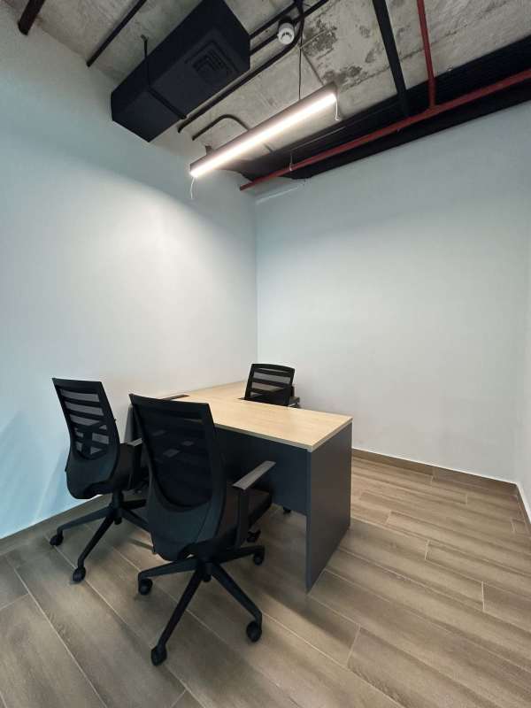 Compact kitchenette with wood-look tile floors, LED ceiling lights, modern cabinetry Costa del Este Panama