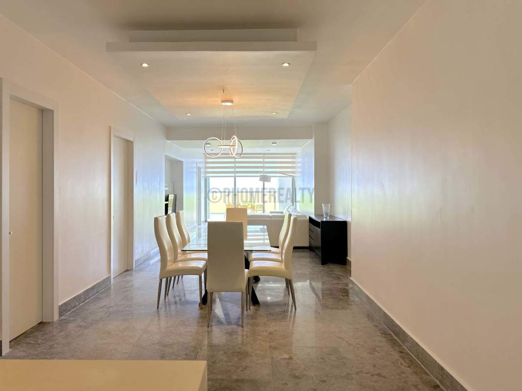 Modern Italian kitchen with large island, granite counter, stainless steel appliances in Yoo Panama on Avenida Balboa