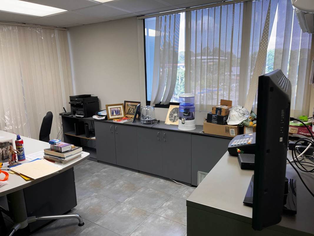 Furnished office space with large windows blinds tile floors at PH IBC Tower Panama