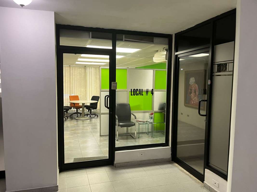 Glass walled meeting room with tiled floors at PH IBC Tower Bella Vista Panama