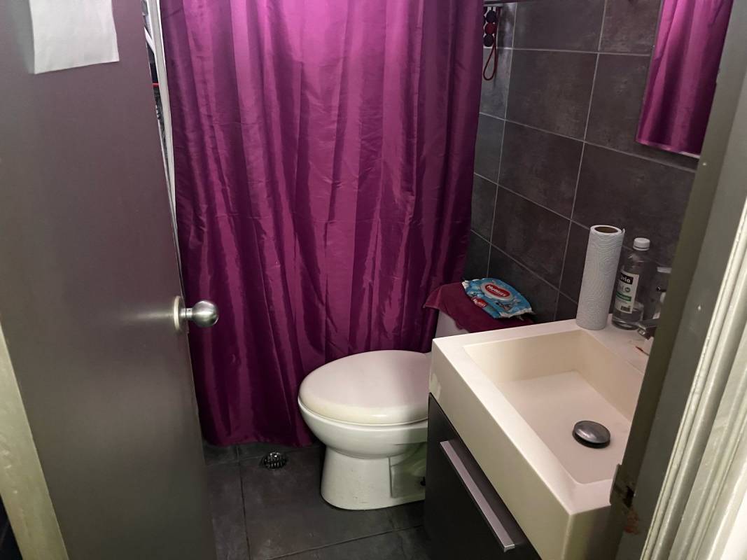 Small contemporary bathroom tiled walls at PH IBC Tower Panama office