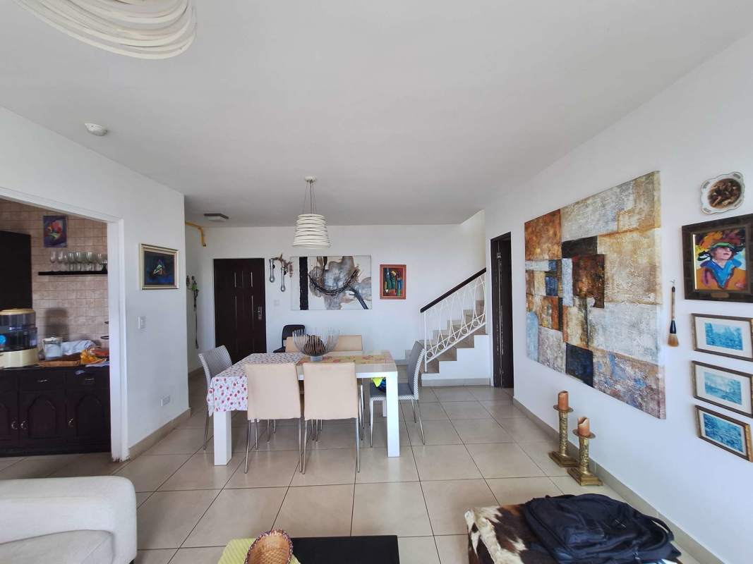 Dining area with open staircase loft apartment in PH Portofino San Francisco Panama