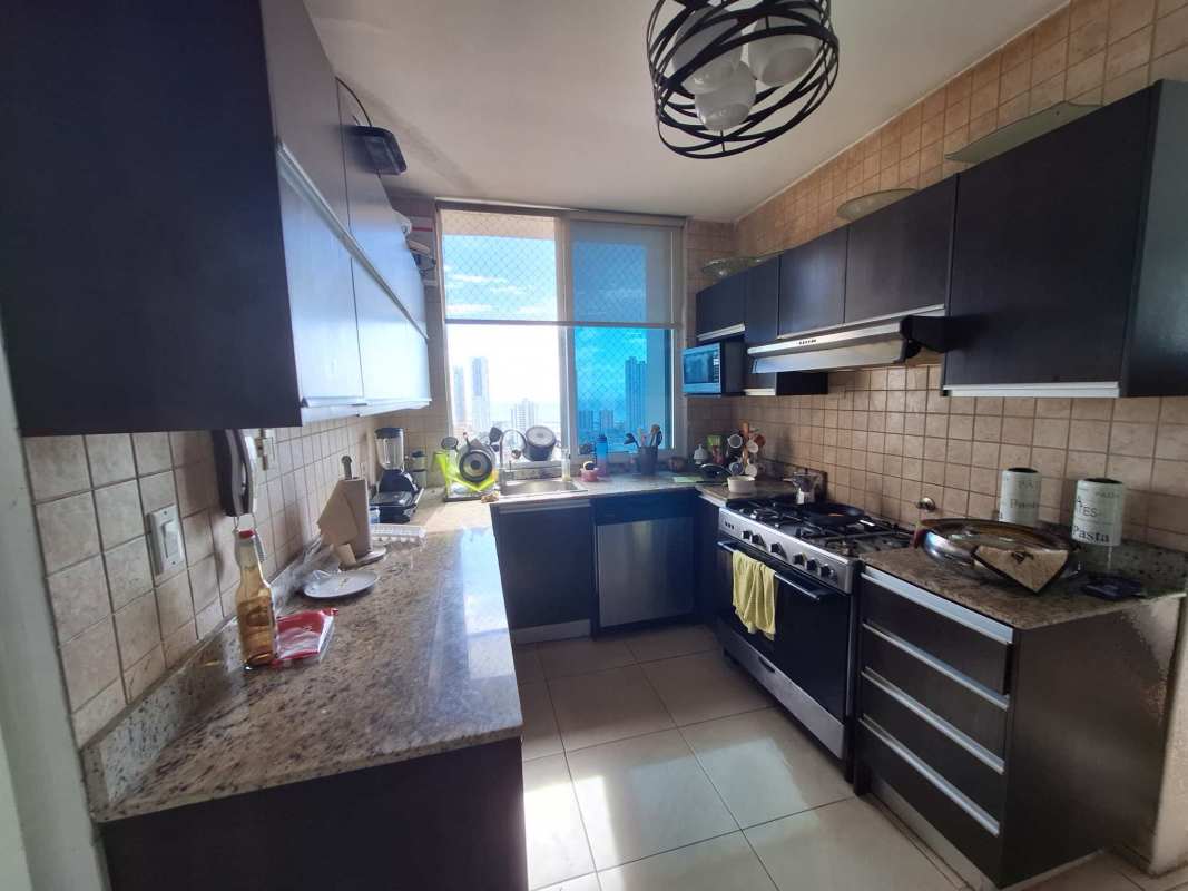 Modern kitchen with granite countertops and appliances PH Portofino Loft San Francisco Panama