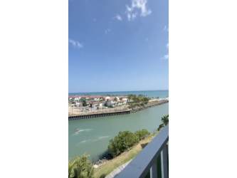 Spacious dining room with pendant lights, ocean views in Buenaventura beach property Panama