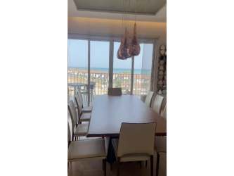 Modern balcony dining set with panoramic ocean view Buenaventura luxury Panama