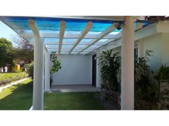 Private heated swimming pool with Jacuzzi, multiple bohíos, lush tropical landscaping, Coronado golf residence Panama