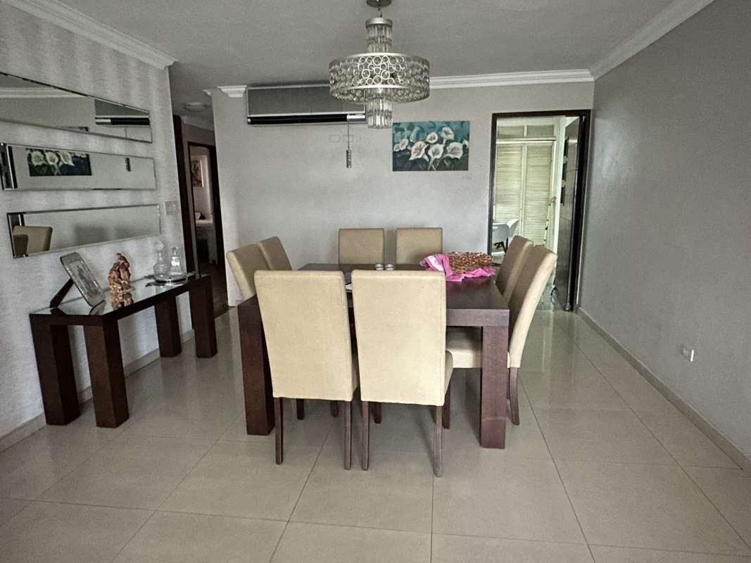 Modern living room area with large windows in PH Country Park, San Francisco Panama