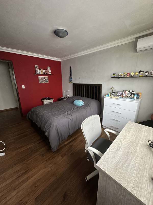 Contemporary dining area with chandelier inside apartment PH Country Park San Francisco Panama City