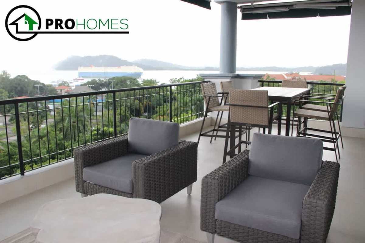 Luxury living room opening to terrace with ocean views in PH Altos de Amador Panama