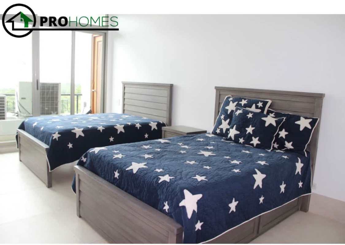 Dining area with balcony access and water views in PH Altos de Amador luxury condo Panama