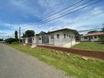 Small bathroom with ceramic tile, pedestal sink, WC in apartment Santiago