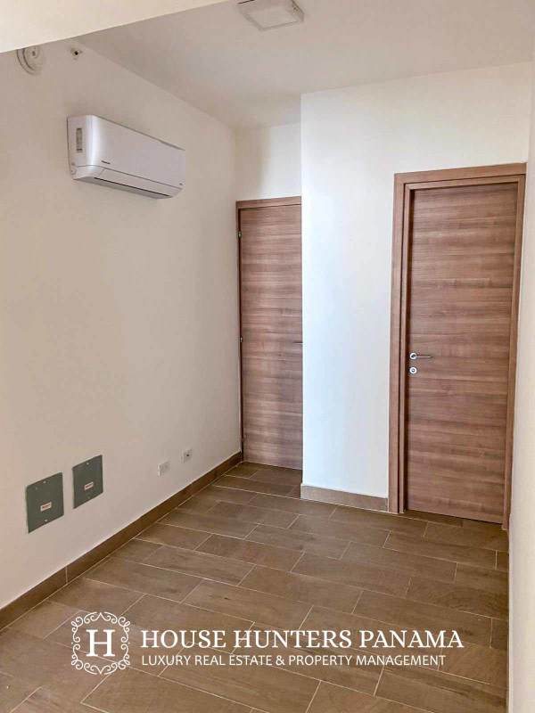 Contemporary kitchen with granite countertops, light cabinetry and large window at PH Dynasty Residence Bella Vista