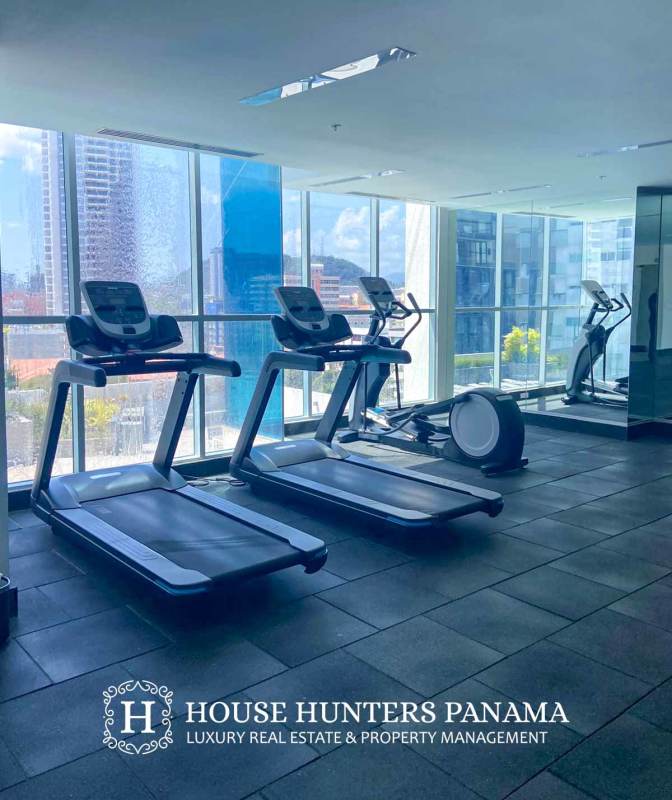 Modern game room with pool table and lounge area at Dynasty Residence Panama City