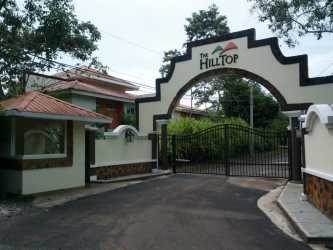 Spacious furnished living and dining room with bright windows at Hilltop Vista Alegre Panama