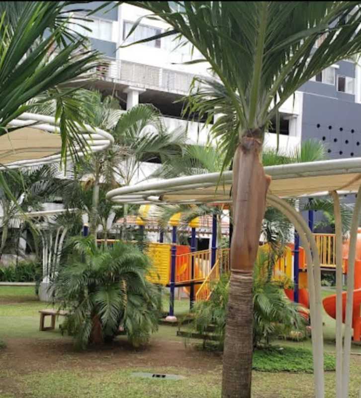 Colorful kids playground in PH Central Park landscaped garden Panama City