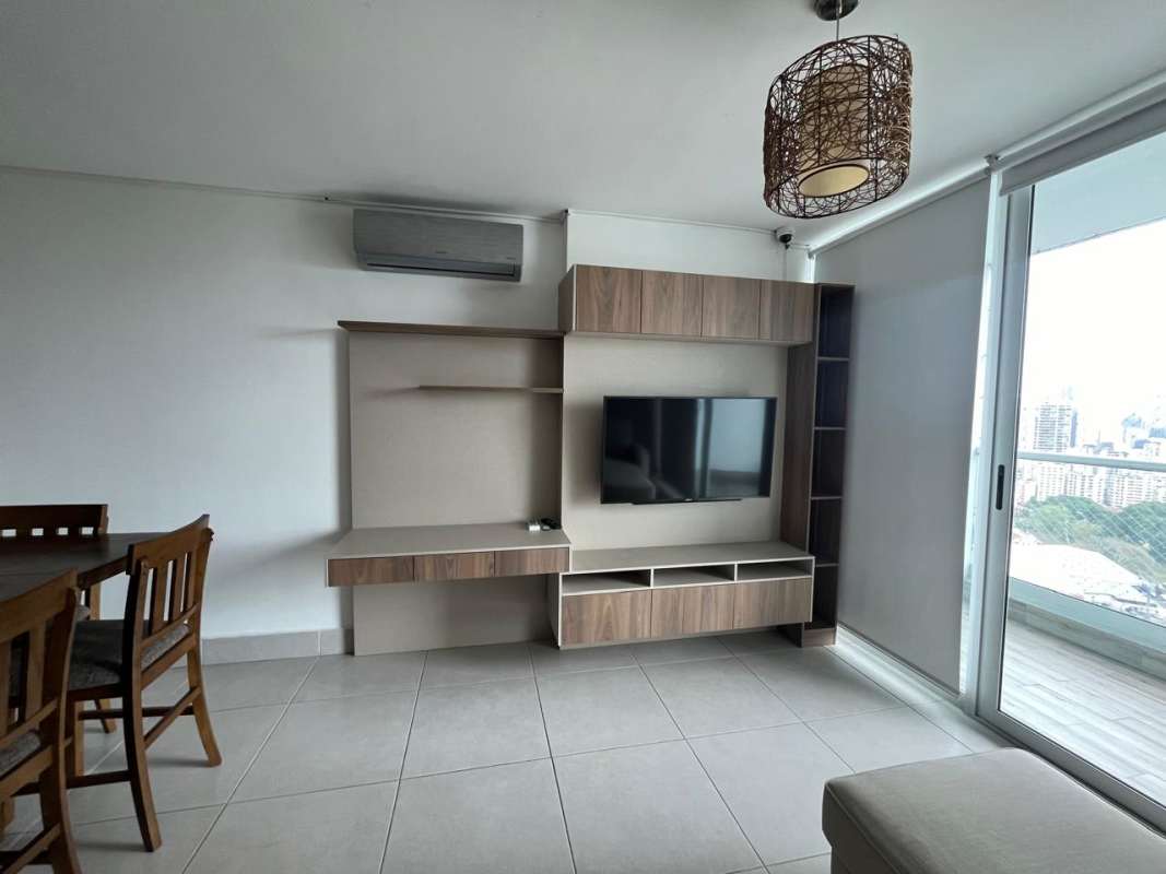 Minimalist equipped kitchen with stove refrigerator in Plaza Edison apartment Panama City