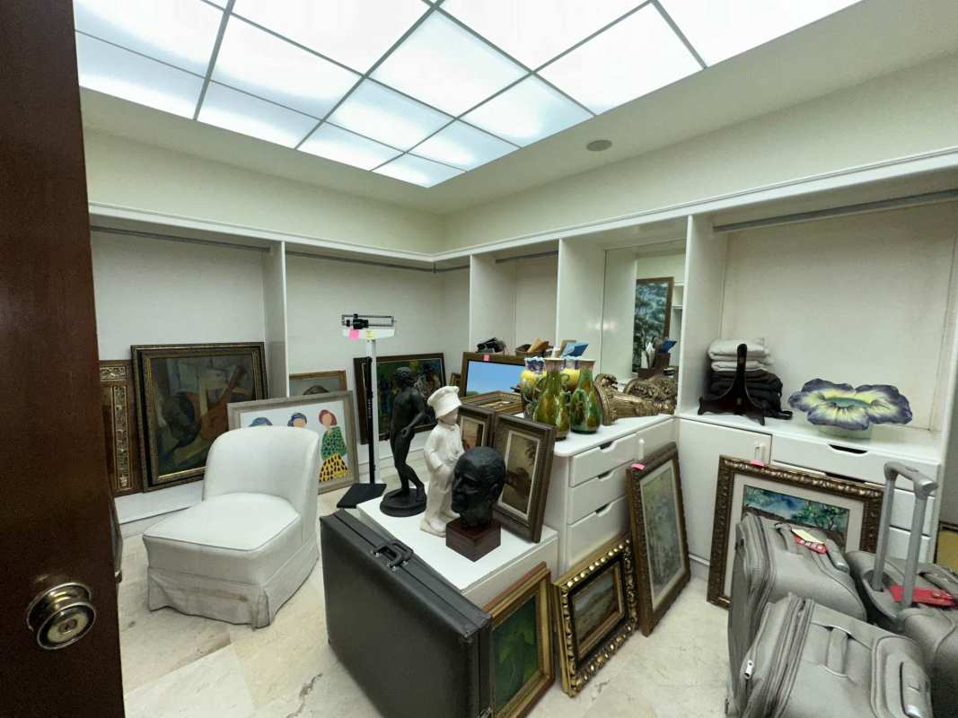 Spacious luxury penthouse living room with large windows ocean views traditional decor PH Panamar Panama