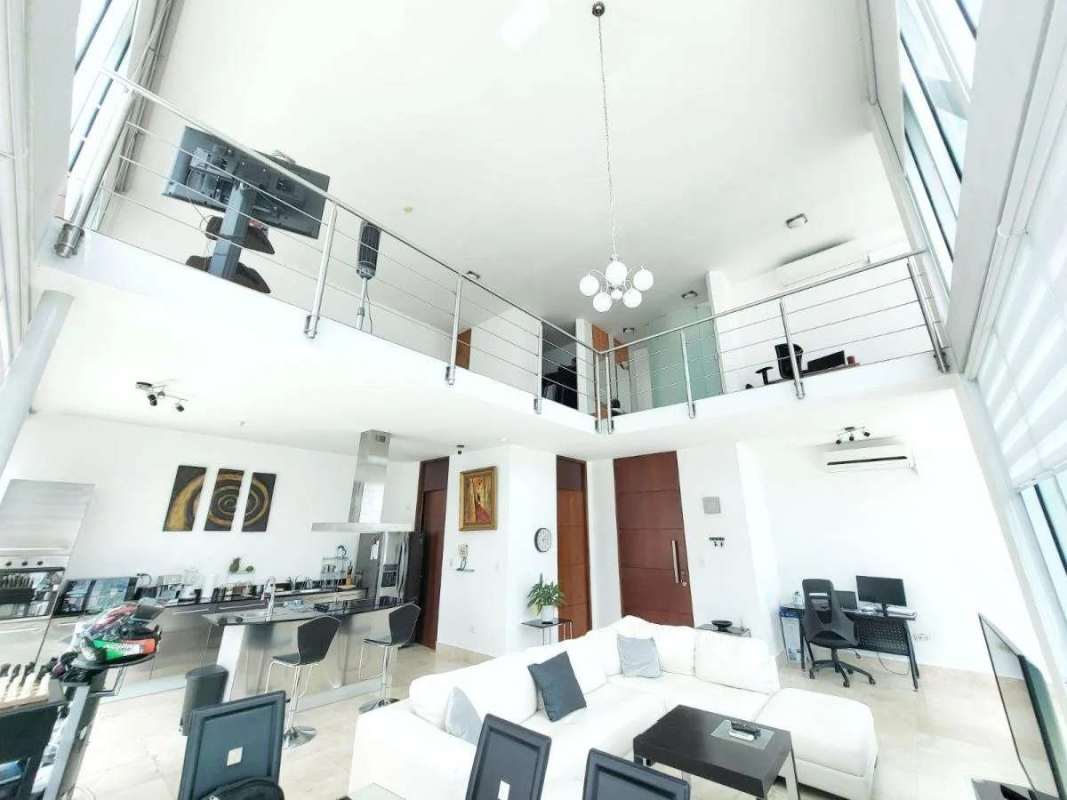 Stylish open kitchen with granite counters and dining loft in Punta Pacifica Panama