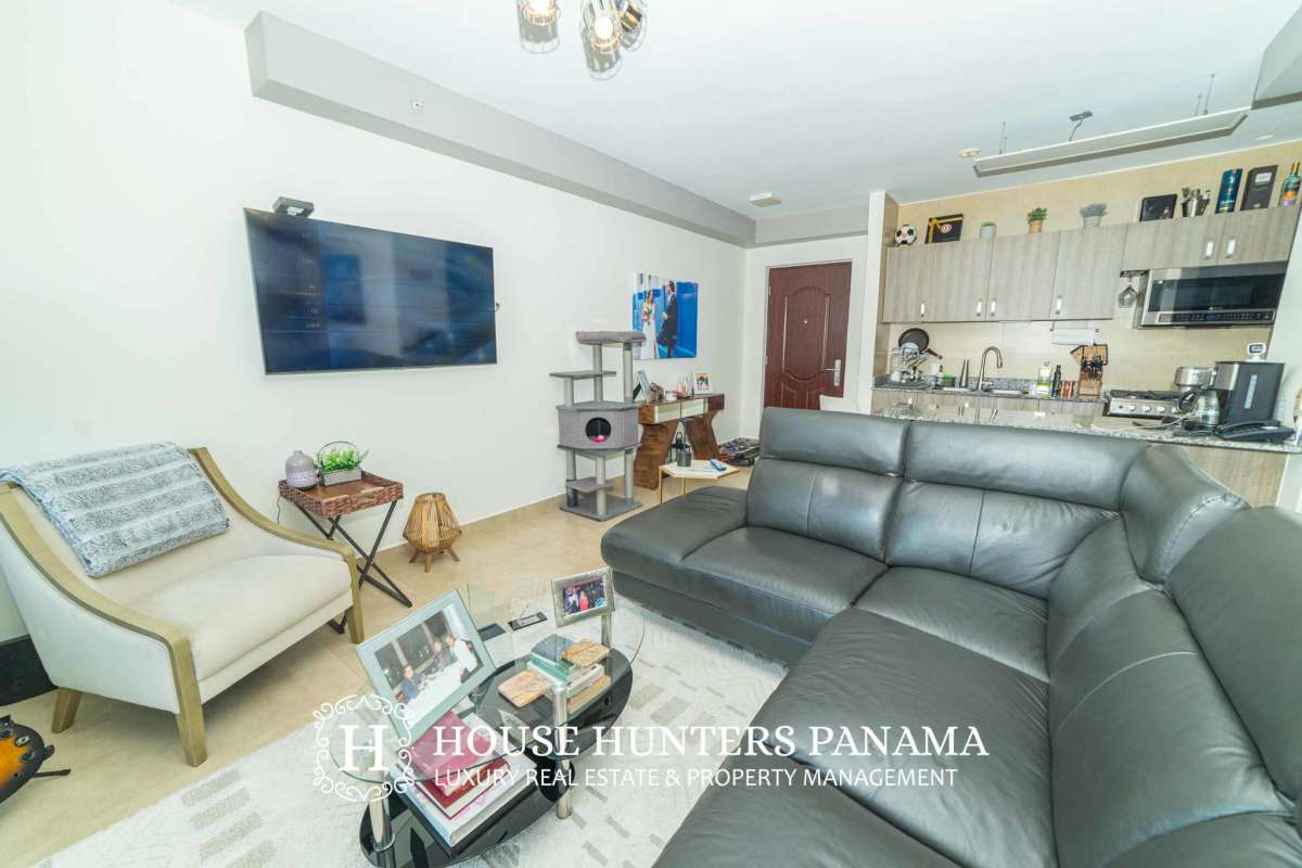 Bright living and dining area with floor-to-ceiling windows and cityscape views in PH The One San Francisco Panama