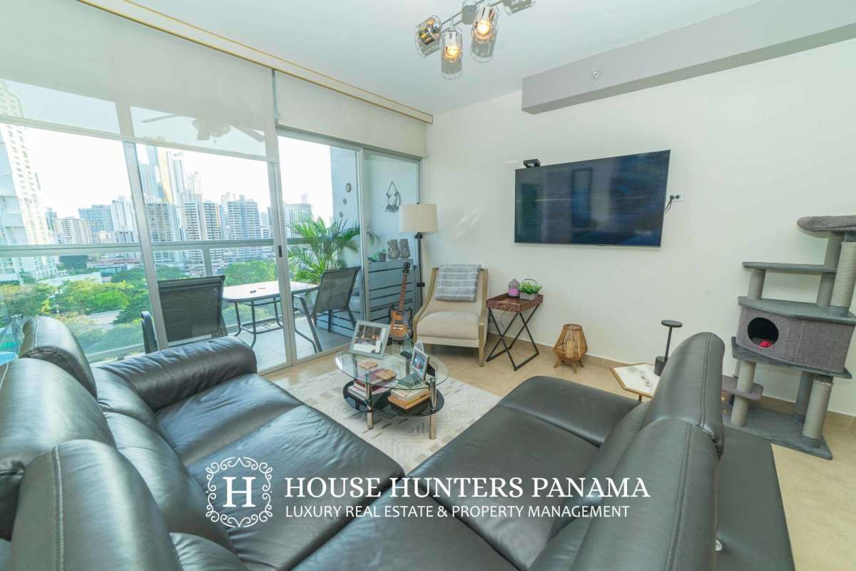 Modern open kitchen with granite counters and integrated appliances PH The One San Francisco Panama