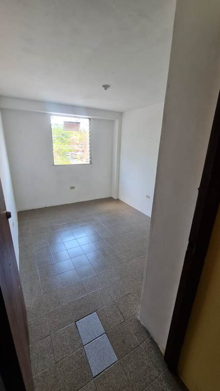 Empty bedroom featuring tile floor and window at PH Morya Pueblo Nuevo Panama