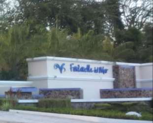 Entrance sign of PH Fontanella del Mar surrounded by manicured landscaping in San Carlos Panama