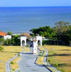 Mediterranean-style gated entrance to beachfront community with ocean view PH Fontanella del Mar Panama