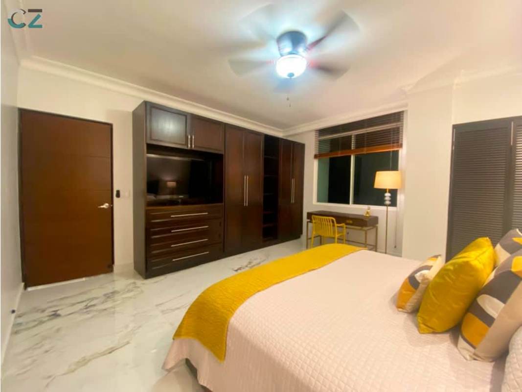 Elegant master bedroom with marble floors and private bathroom PH Sunrise Obarrio Panama