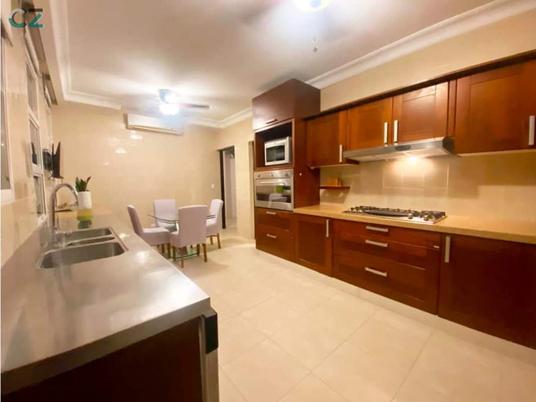 Open plan living dining room with marble floor and elegant decor PH Sunrise Obarrio Panama City