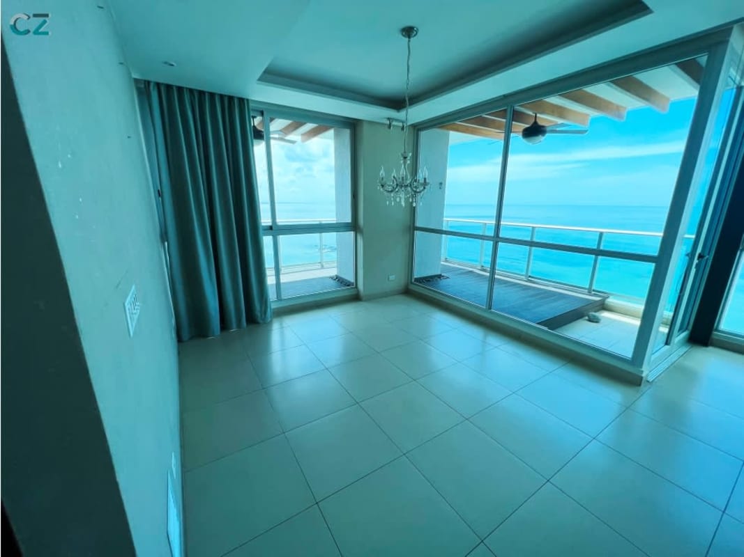 Granite countertop kitchen with breakfast bar and appliances at Punta Pacifica PH Oceanaire Panama