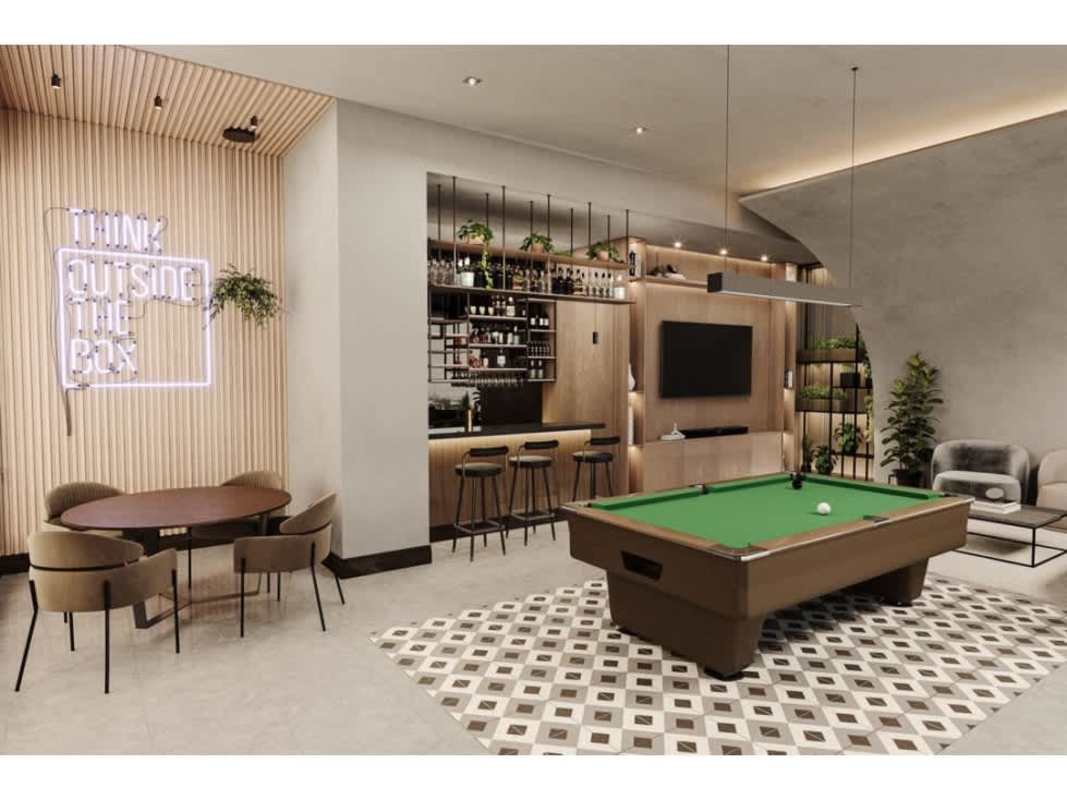 Game room lounge with pool table, bar and neon sign Condado Gardens Panama