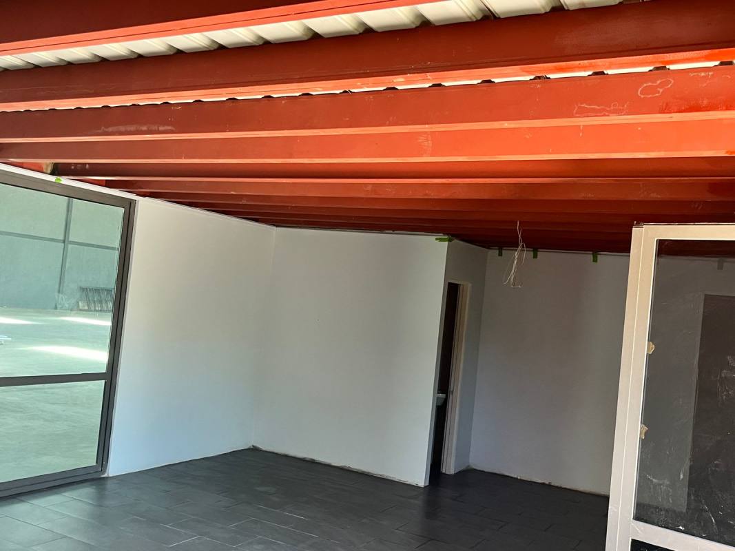 Industrial warehouse with parking spaces exterior view Cerro Azul Panama City