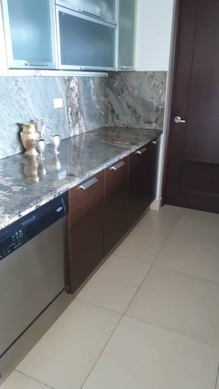 Modern living room with floor-to-ceiling windows city and ocean views furnished PH Dupont Punta Pacifica Panama