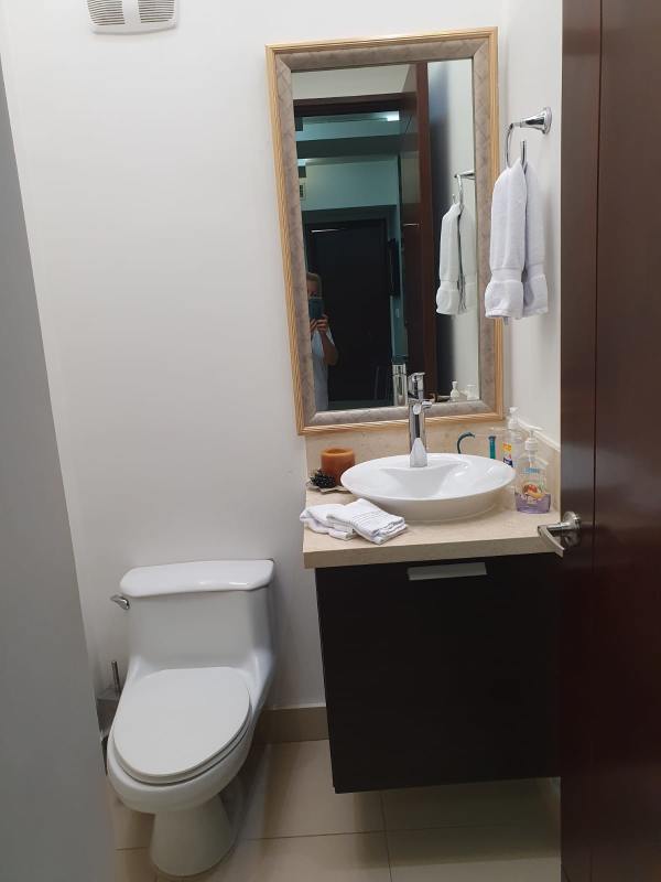 Dining area with ocean and skyline views inside PH Dupont luxury condo Panama