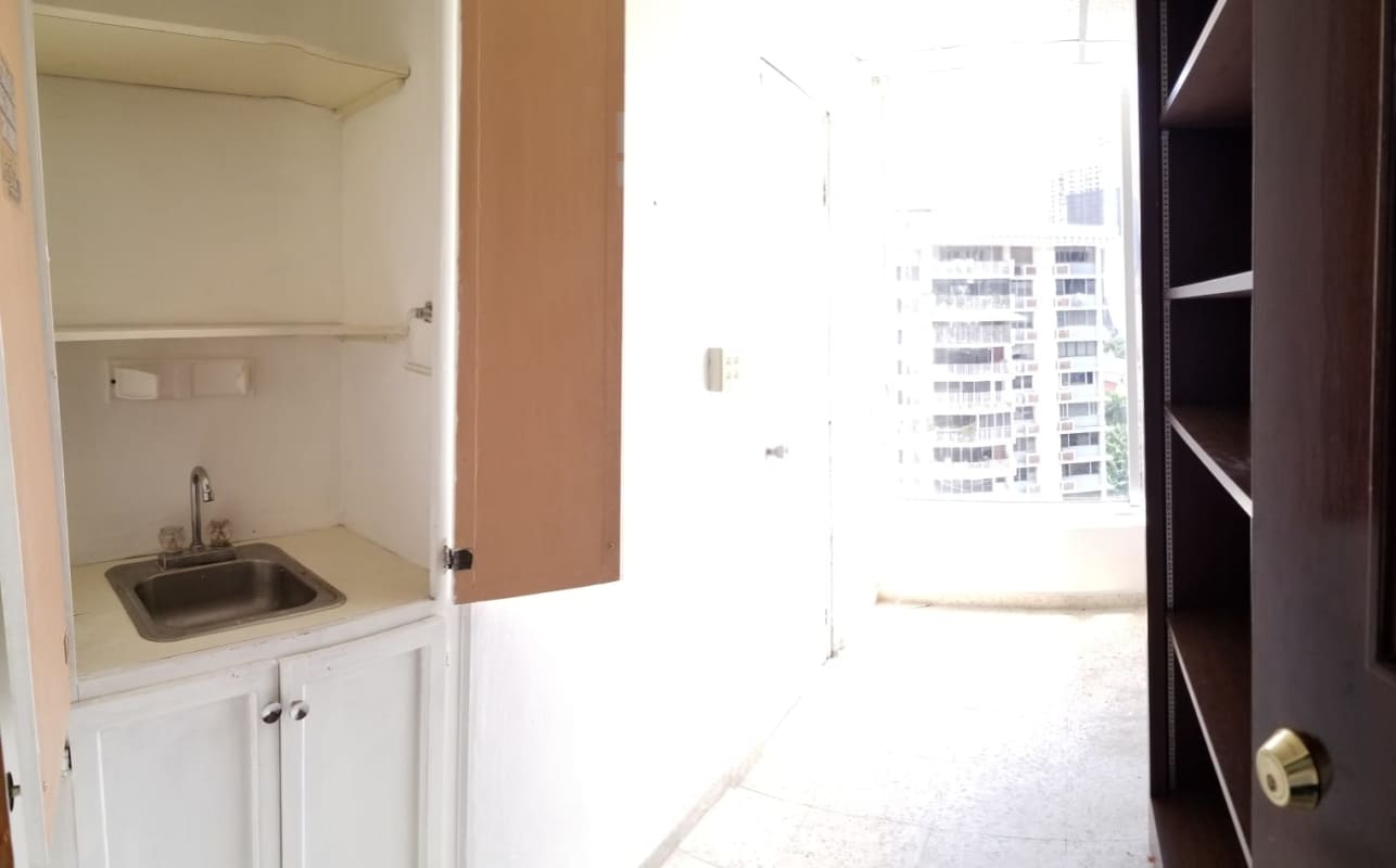 High-rise commercial office tower with glass facade in Bella Vista Panama