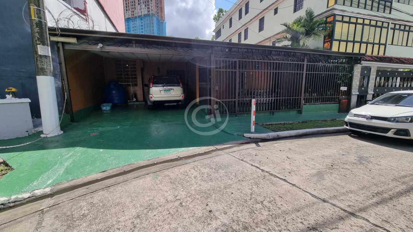 Back garden with mature plants and private patio at house near Ricardo J. Alfaro Tumba Muerto Panama City