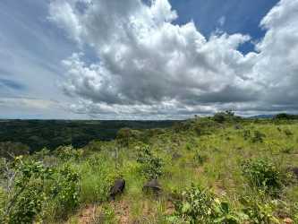 Wide view over fertile rolling hills and Pacific Ocean horizon San Carlos Panama