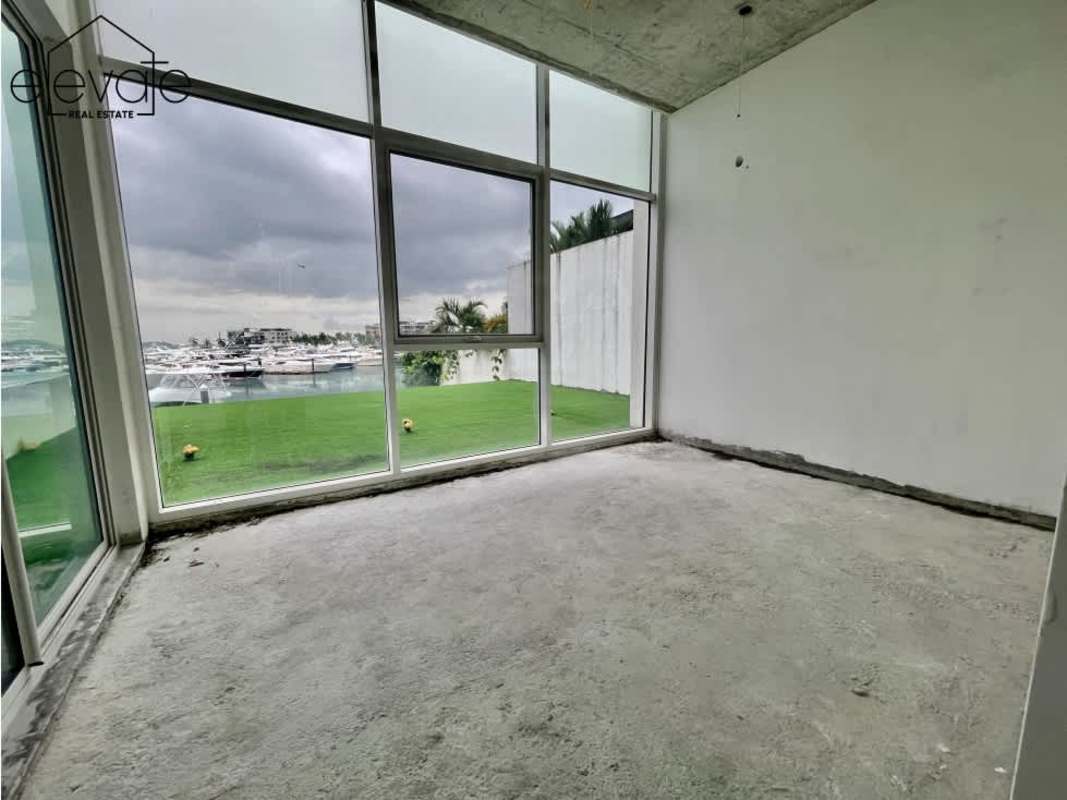 Private terrace with artificial grass overlooking marina from Ocean Reef Islands penthouse Panama City