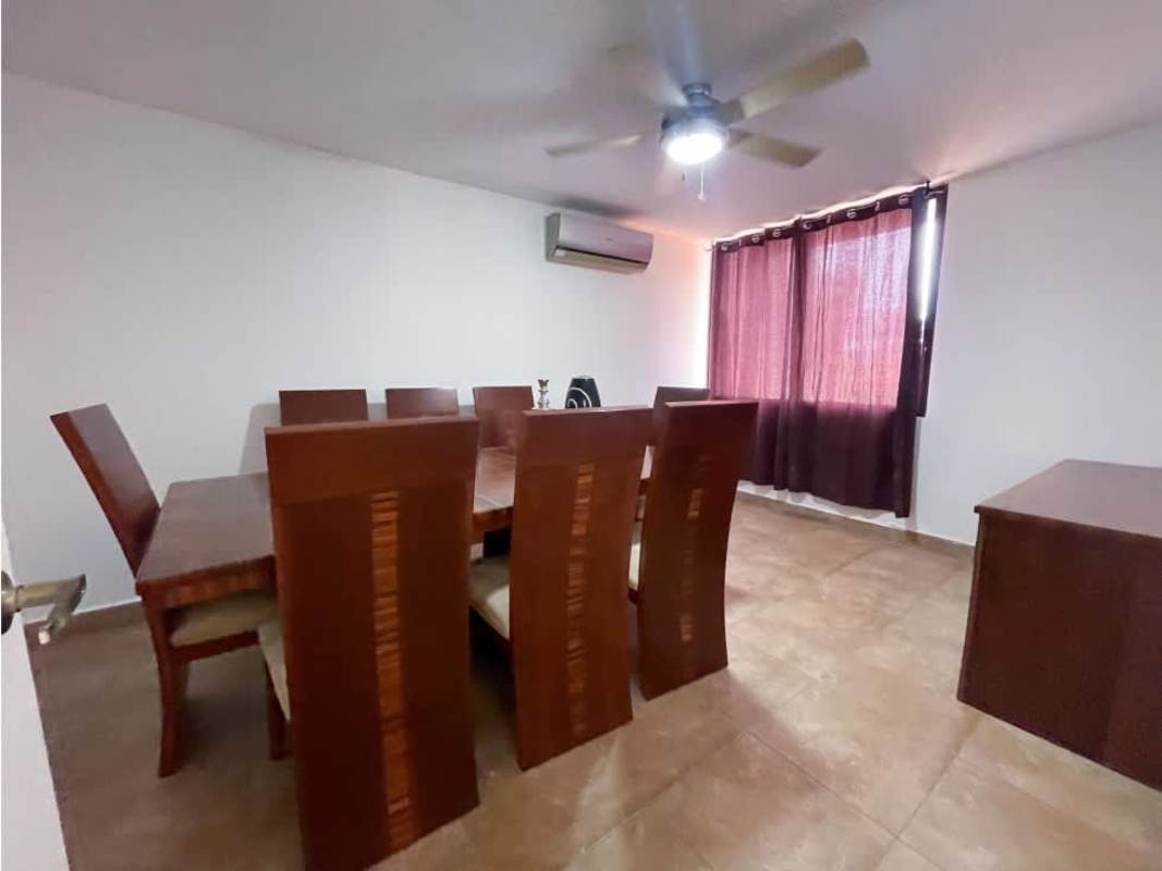 Modern kitchen with granite countertop and city view window in Torre VIP Panama City