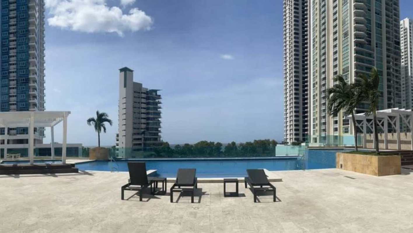 Ocean front balcony views from two-level penthouse at PH Titanium Costa del Este Panama