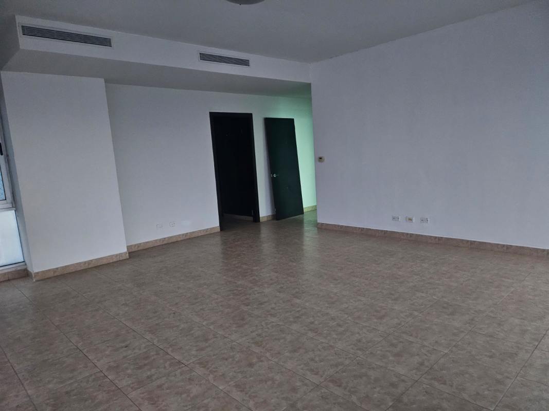 Two-level penthouse spacious living room with ocean views through floor-to-ceiling windows in PH Titanium Panama