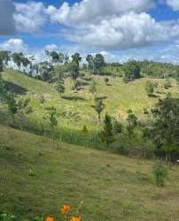 Hilly farmland with dense green vegetation countryside Claras Arriba Capira Panama