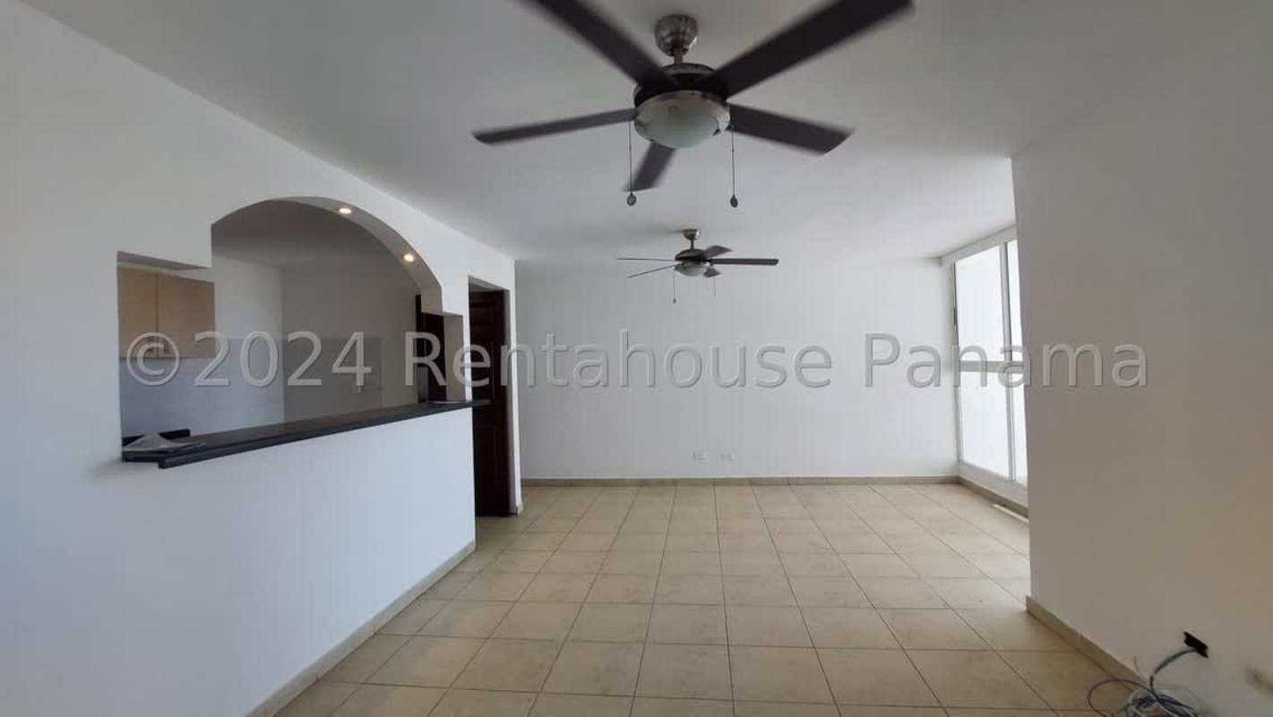 Living dining space with bright natural light and tile floors in PH Twelve October