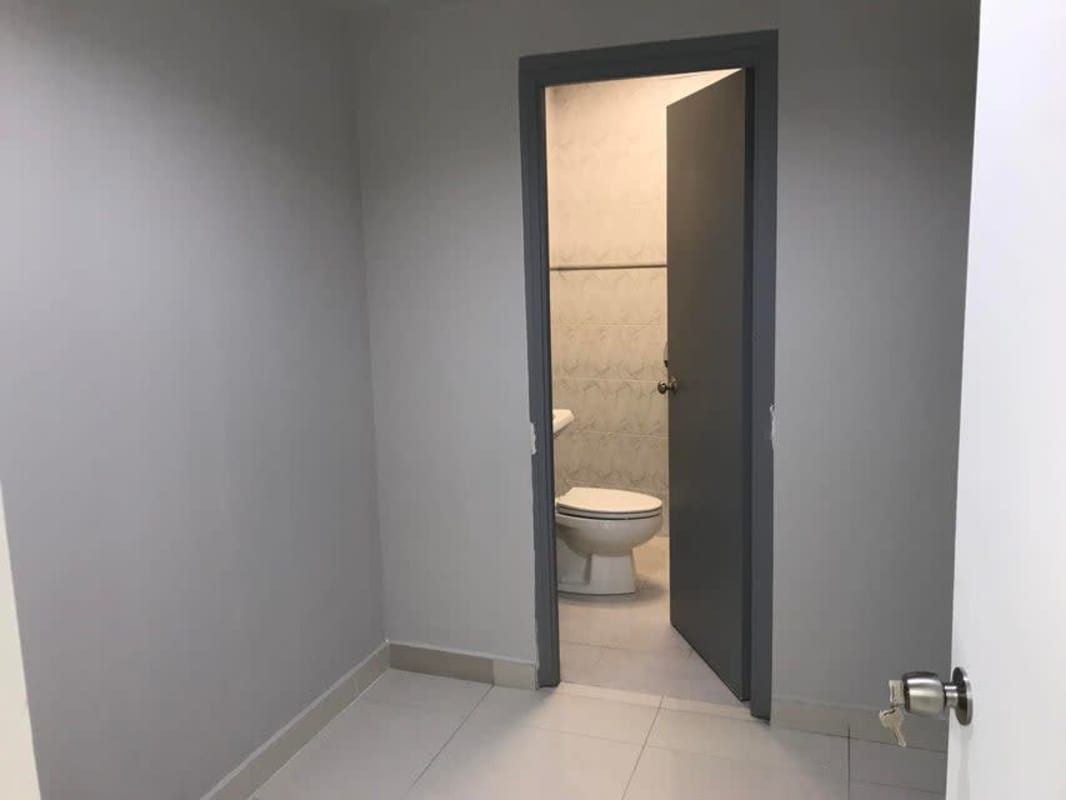 Empty office space tiled floors modern drop ceiling Banesco Tower Panama