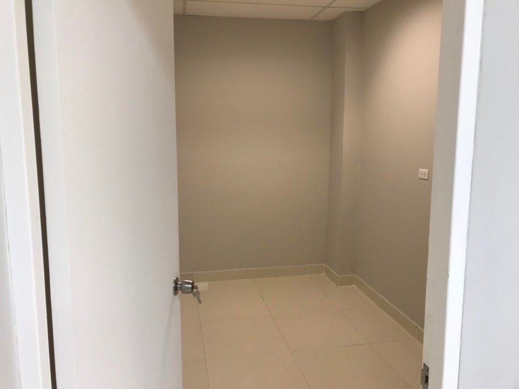 Modern curved glass Banesco Tower skyscraper facade Marbella Panama City