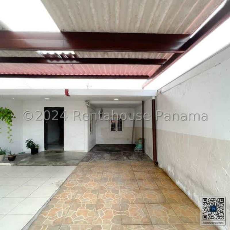 Bright living room with tiled floors and open kitchen view house for sale Chanis Panama